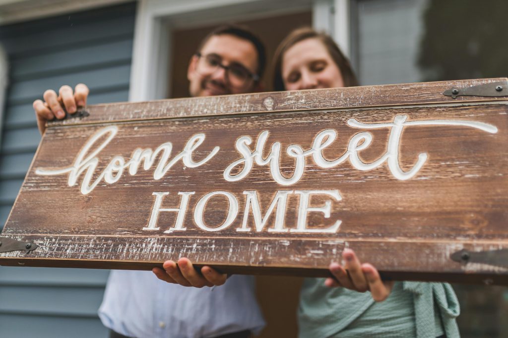 Front view of a home in Coshocton County, Ohio with home sweet home sign