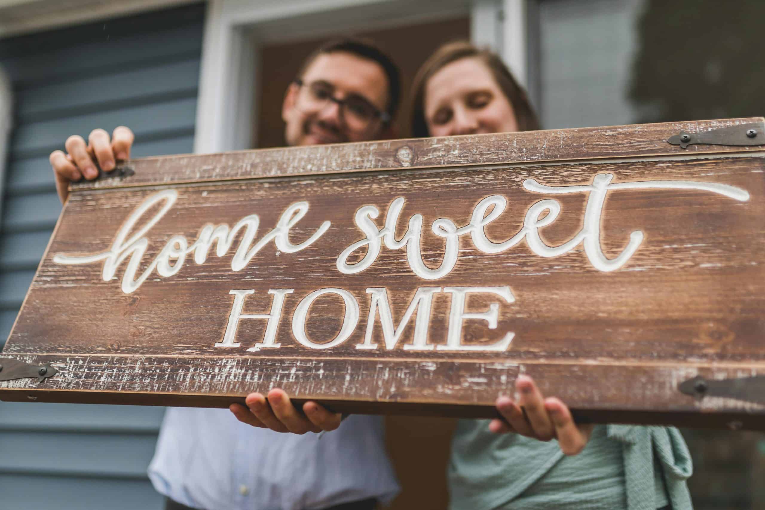 Front view of a home in Coshocton County, Ohio with home sweet home sign